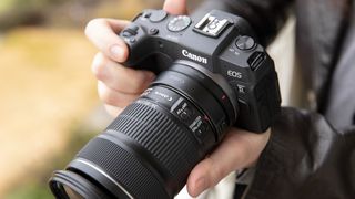 handholding the Canon EOS R with two hands for extra stability