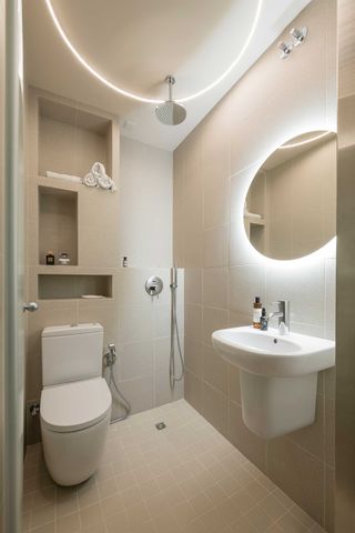 a small bathroom with led lighting