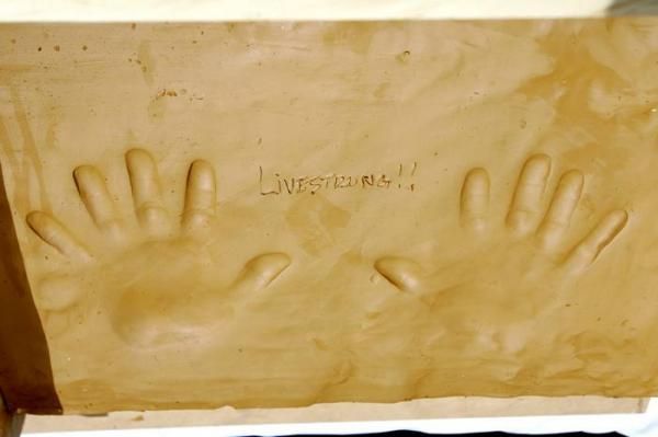 Handy work: Lance Armstrong left an impression on the site of the new Flinder&rsquo;s facility.