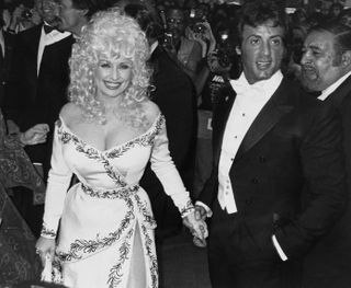 best 80s red carpet moments dolly parton sylvester stallone