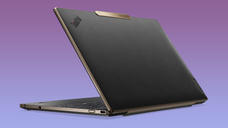 Lenovo ThinkPad Z13 in bronze leather on a purple gradient background