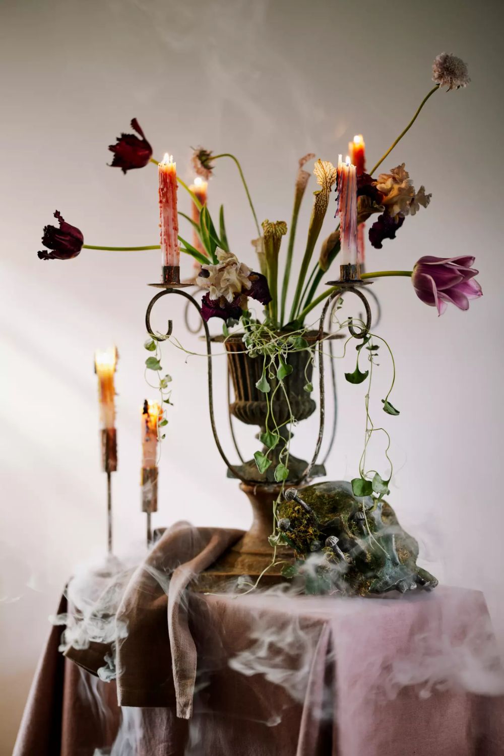 Halloween centerpiece with taper candles and tulips