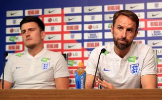 Gareth Southgate, right, was forced into a selection U-turn on Maguire