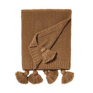 Brown knit blanket with tassels
