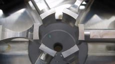 Scientists have developed a device (shown here) that makes liquid droplets "dance," hovering in midair, without exploding.