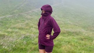 a photo of Tom's Guide Senior Fitness Writer Jessica Downey wearing the Rab Firewall Mountain Waterproof Jacket