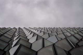 Designed by Olafur Eliasson and Henning Larsen, Harpa's geometric façade is inspired by Iceland's crystalline basalt columns