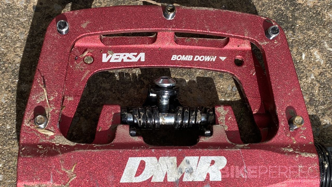 DMR Versa pedal showing the "bomb down" etching on the platform side of the pedal body