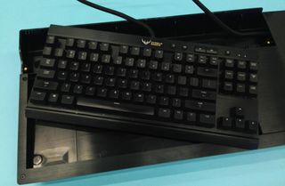 The Corsair K65 keyboard unmounted from the Lapdog frame.