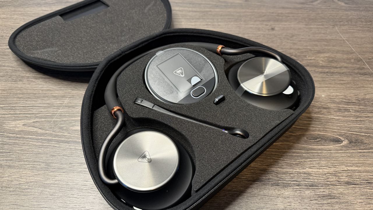 The Turtle Beach Stealth Pro 2 gaming headset in its carry case sitting on a wooden surface