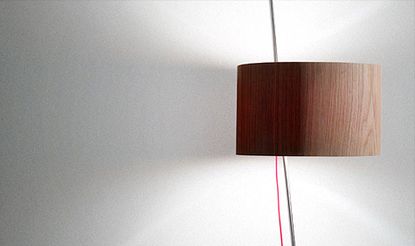 Moveable wooden lamp shade