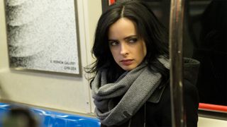 Jessica Jones sits on the subway in the first season of her Netflix Marvel show