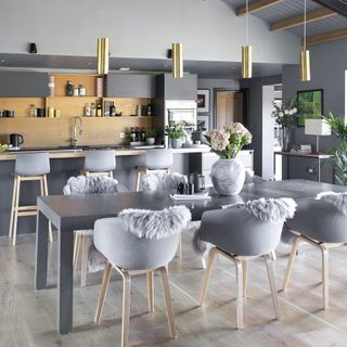 kitchen with grey coloured table and chairs