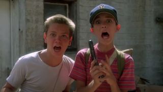 Gordie holding gun and screaming with Chris in Stand By Me