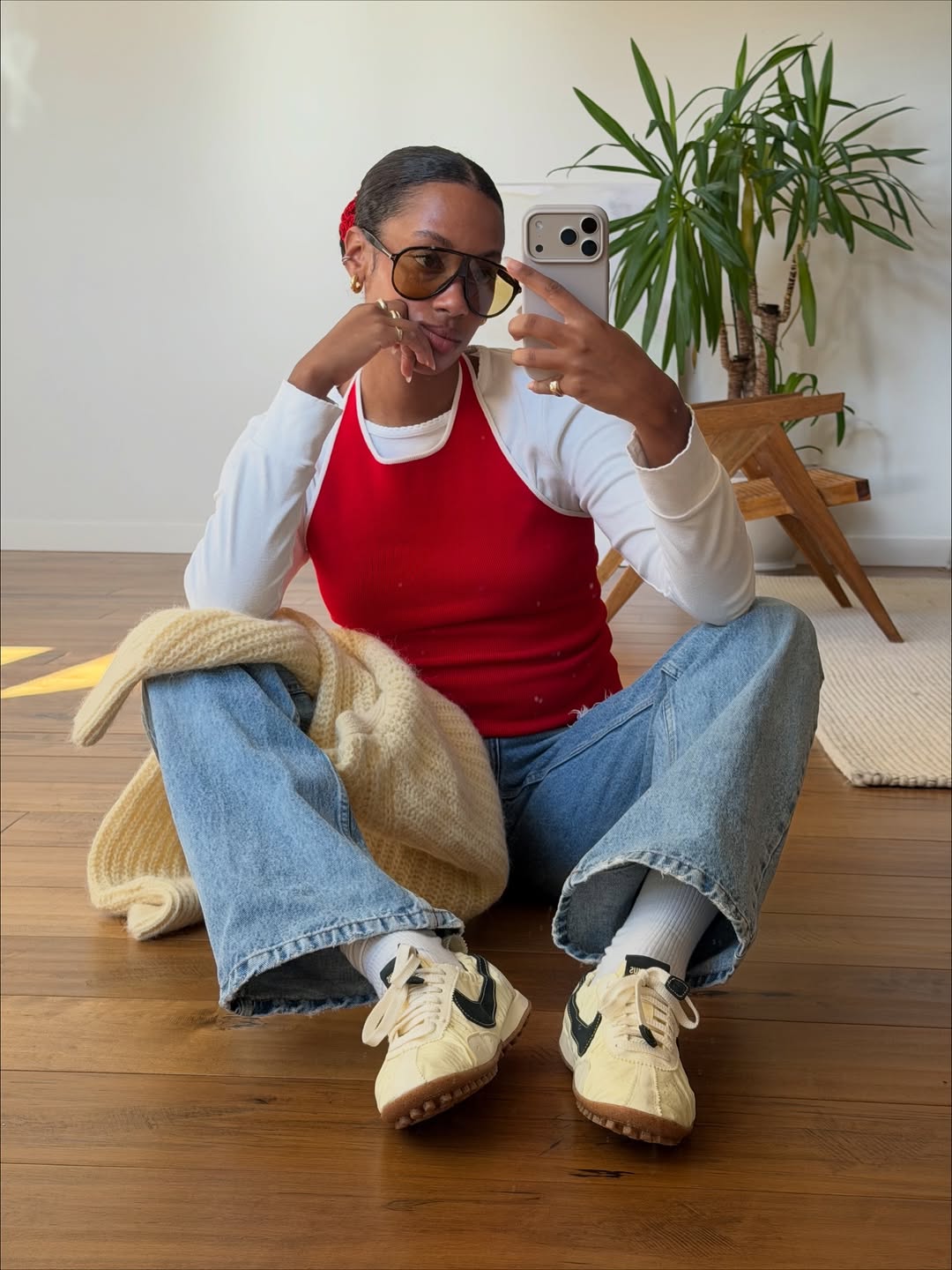 Claire Most in light-wash jeans