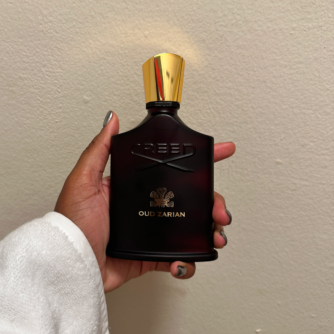 Ariel Baker testing Creed Oud Zahrian.