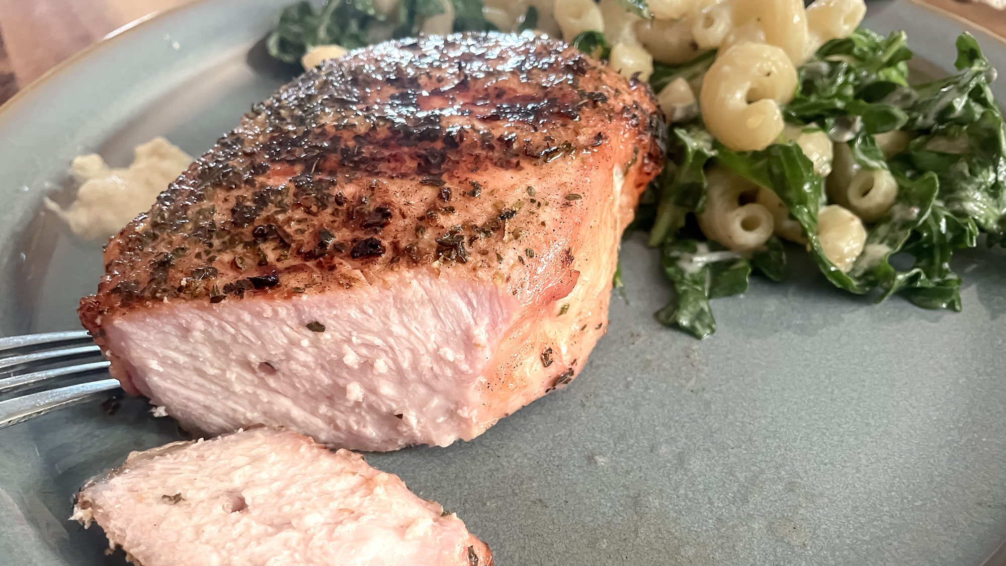 Meat being cooked on the Masterbuilt Gravity Series 1150