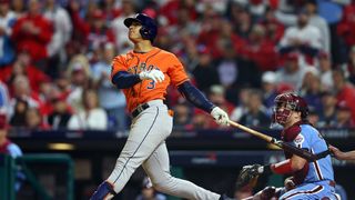 The Astros' Jeremy Pena watches a home run he hit soar in the World Series live stream