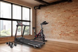 JLL Fitness equipment in the corner of a room
