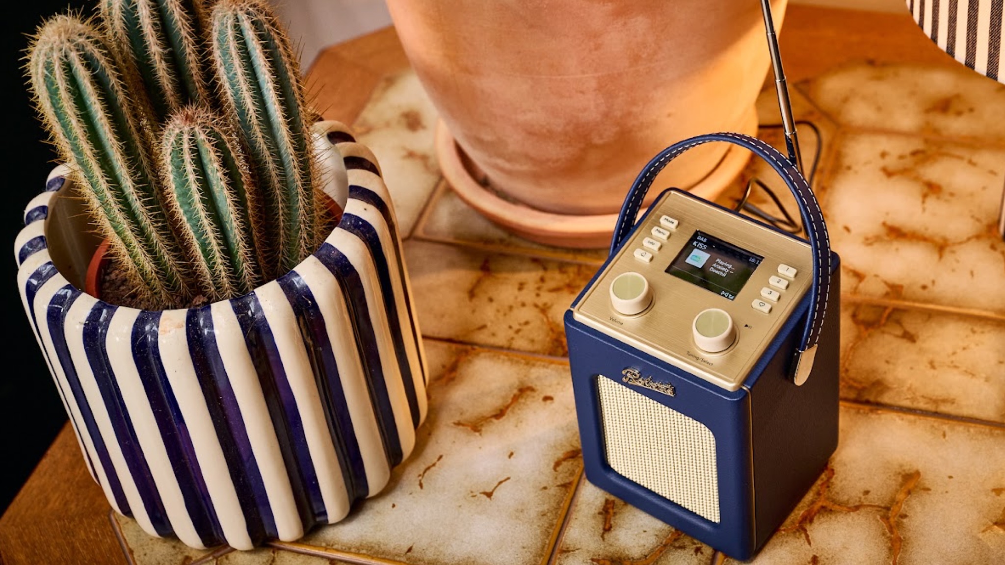 Roberts Revival Mini 2 in dark blue shot from above to show the colour LCD and revised control layout