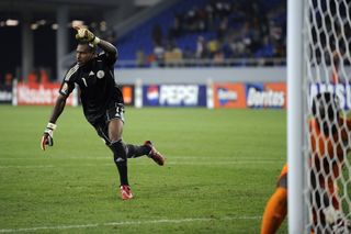 Vincent Enyeama celebrates after scoring the winning penalty for Nigeria against Zambia at the 2010 Africa Cup of Nations.