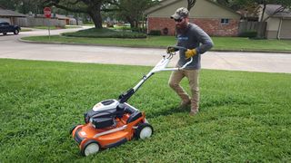 STIHL RM 655 VS Lawn Mower in yard