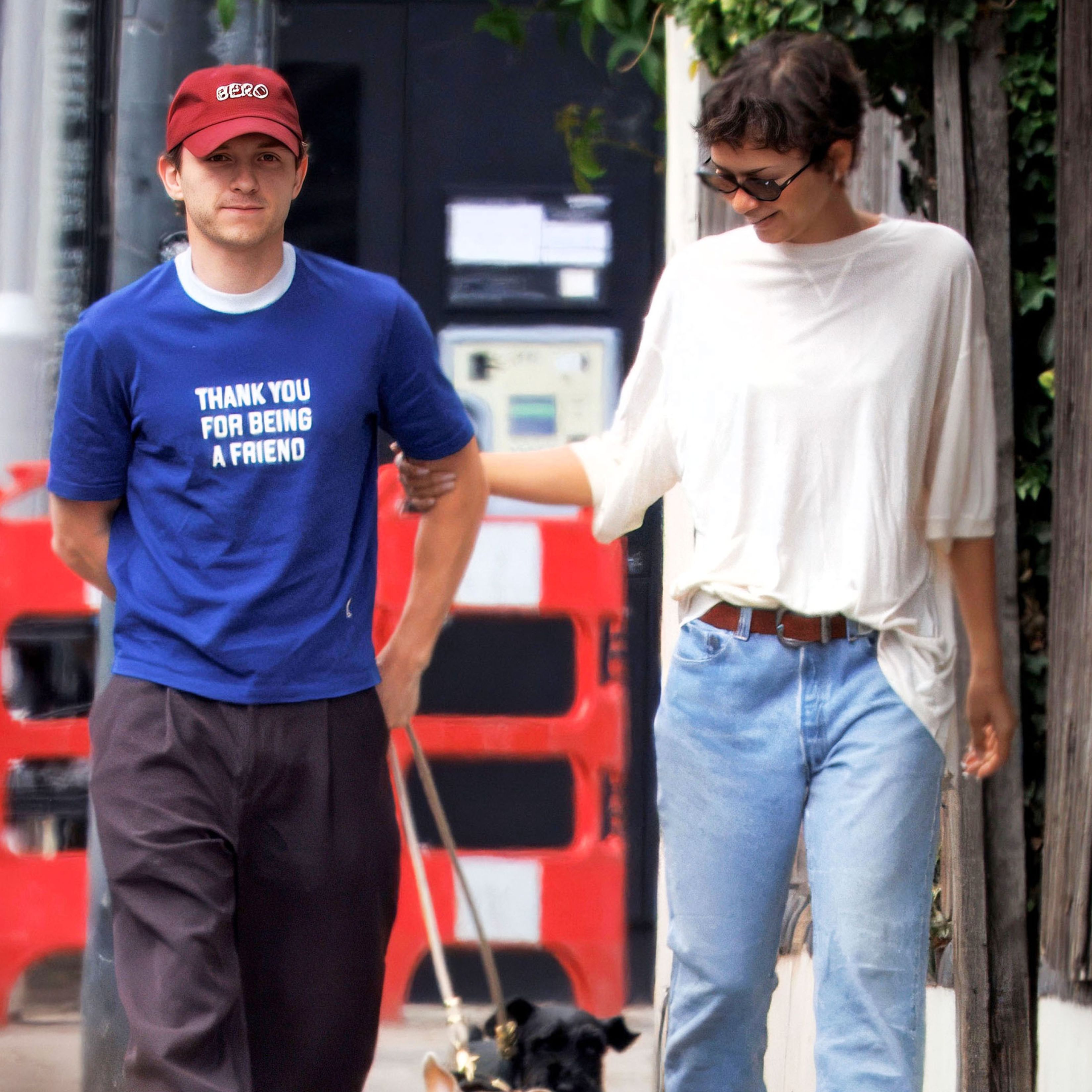 Zendaya and Tom Holland photographed wearing matching wedding rings whilst walking dogs in London, UK.
