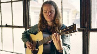 Billy Strings playing his Martin signature acoustic