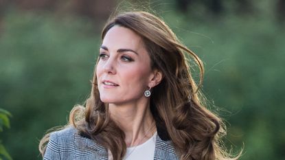 Kate Middleton's black cherry capri trousers are one of our favourite looks on the Princess as she opted for a bold berry ensemble