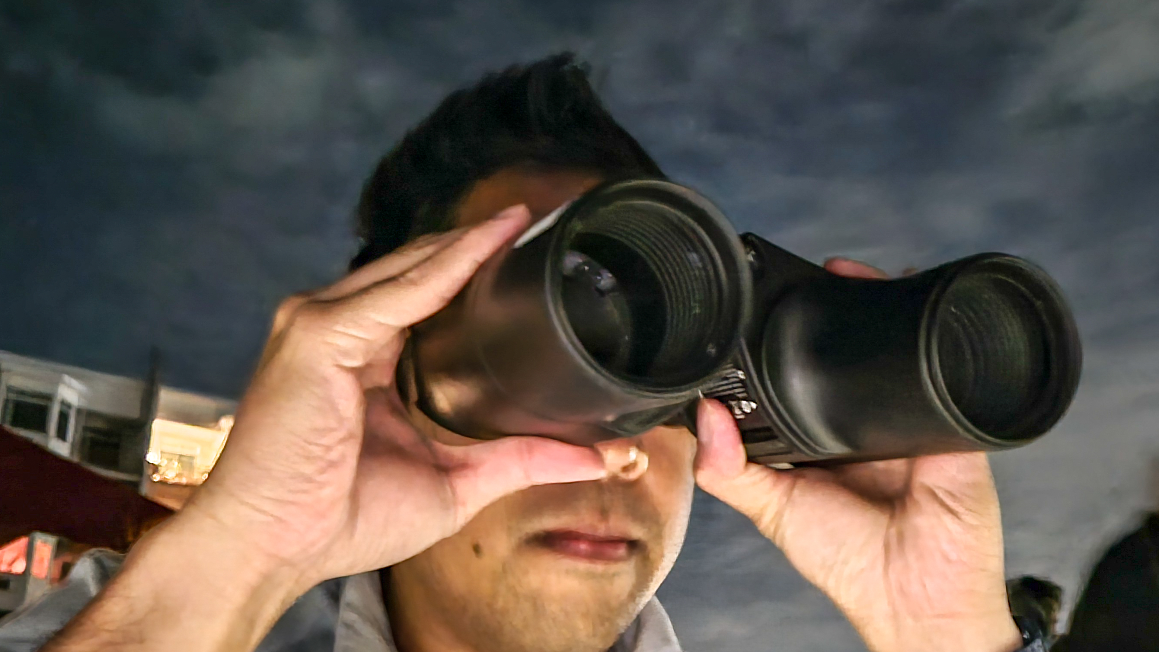 Unistellar Envision smart binoculars used at night.