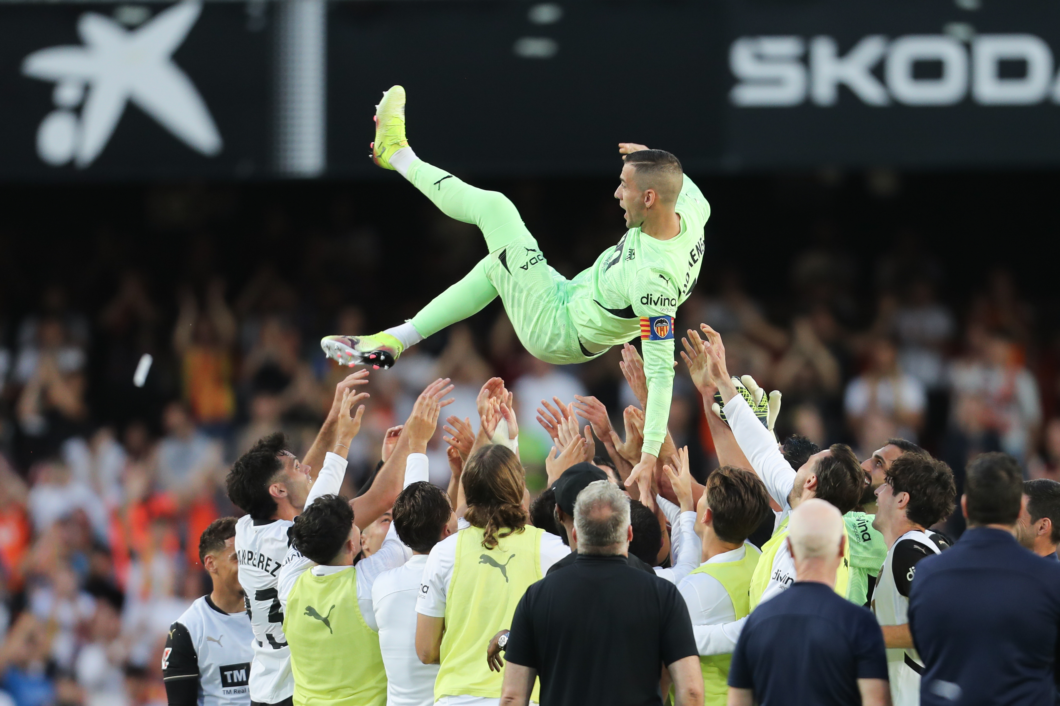 Valencia captain Jaume Domenech is thrown into the air by his team-mates after his last match for the club at Mestalla, against Athletic Club, in May 2025.