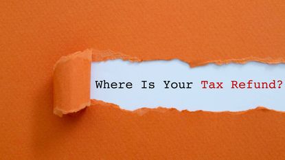 picture of the words "where is your tax refund" printed under a torn piece of paper