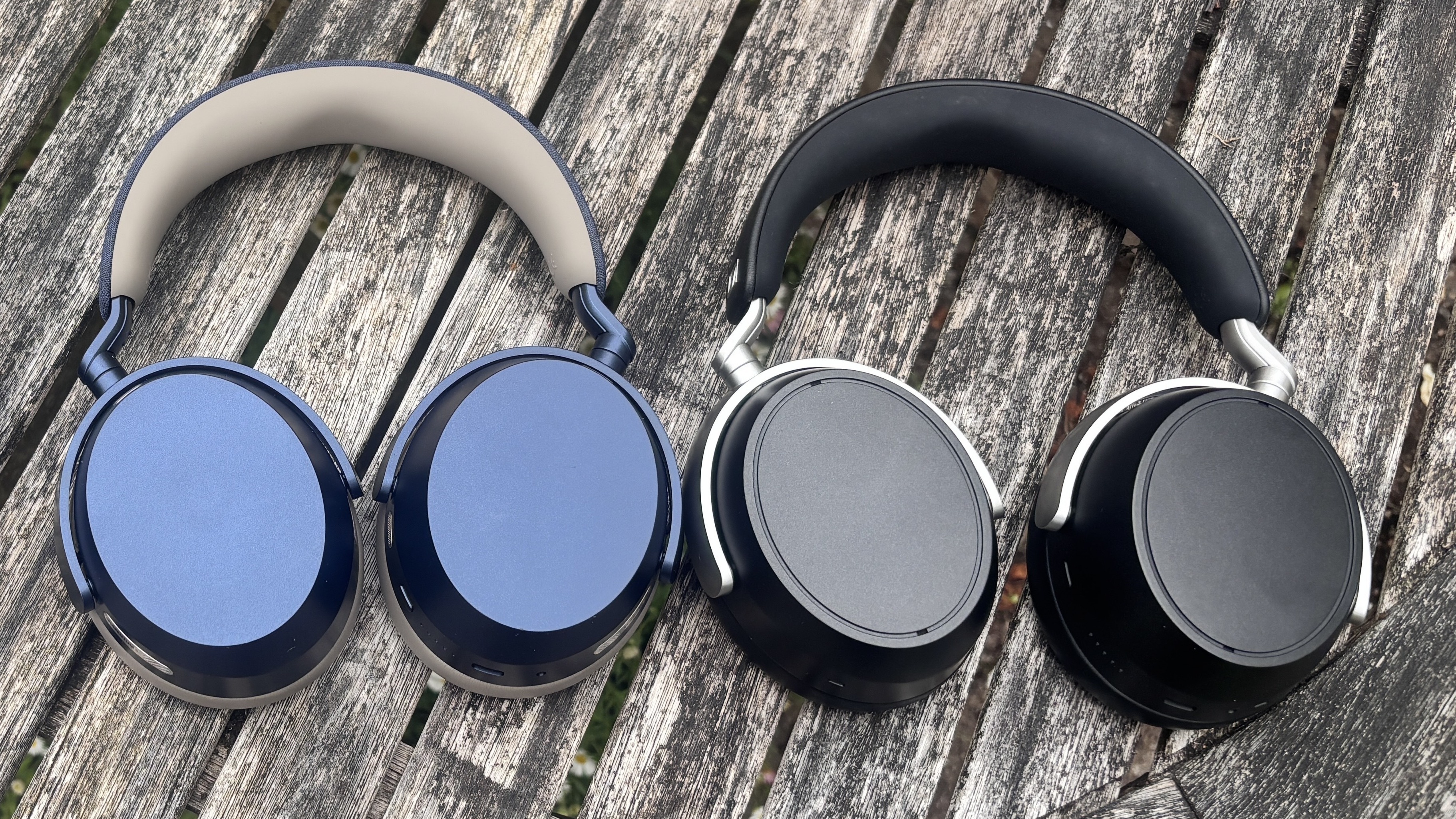 Sennheiser Momentum 5 Wireless and HDB 630 on a table