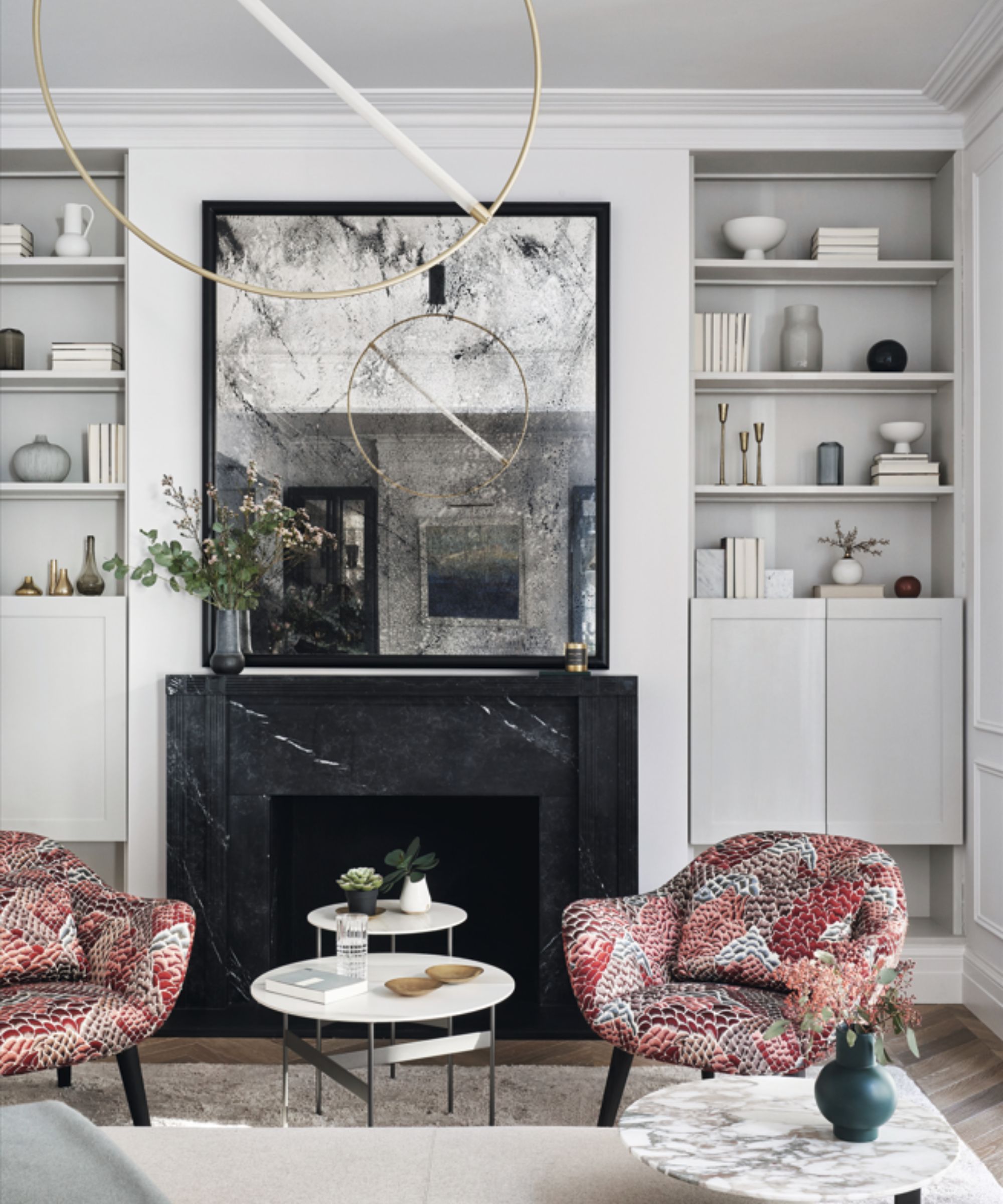 monochrome living room with statement chairs