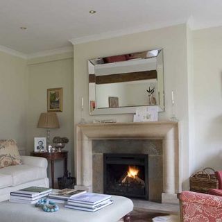 sitting room with fireplace and photoframe on wall