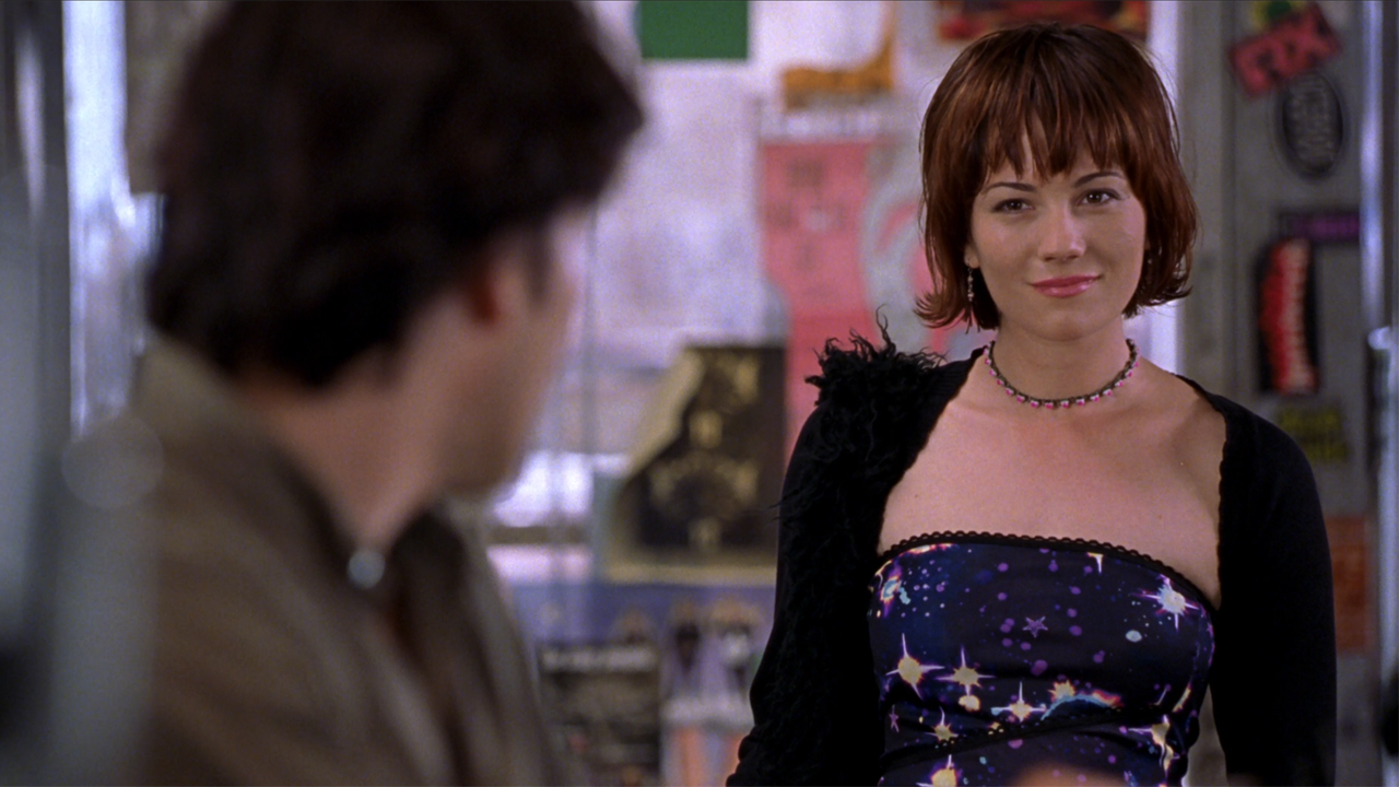 John Cusack as Rob Gordon with Caroline Fortis in High Fidelity