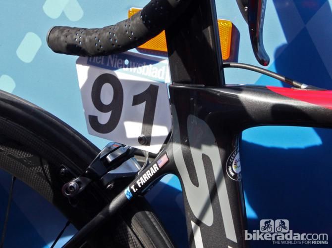 Garmin-Sharp team mechanics clearly take a lot of pride in how the riders' number plates are installed. Note how precisely the front of Tyler Farrar's plate is cut to follow the profile of the frame
