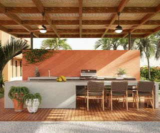 Outdoor kitchen with a formal seating area attached