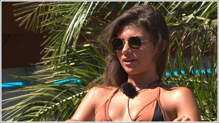 Samie wearing hexagonal sunglasses on Love Island 2023