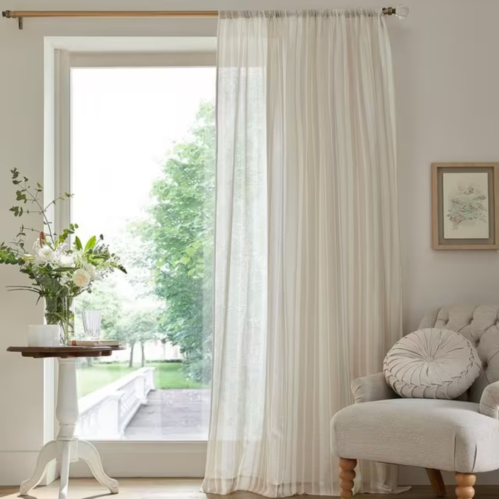 White sheer voile curtains in a neutral room