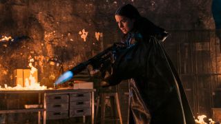 Ana de Armas as Eve with a flamethrower in Ballerina