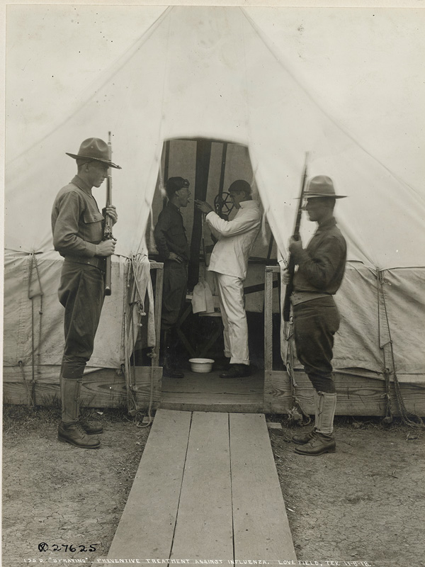 A U.S. soldier receives preventative treatment for the flu