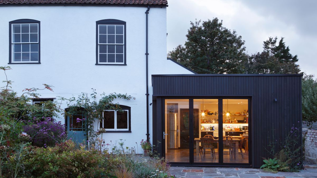 Modern extension built onto the side of a listed period property.