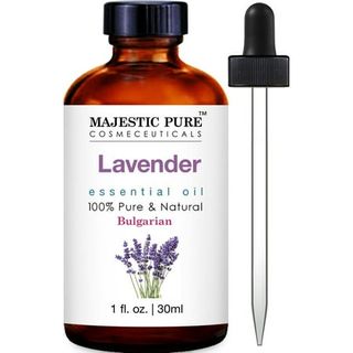 An amber glass bottle of lavender essential oils