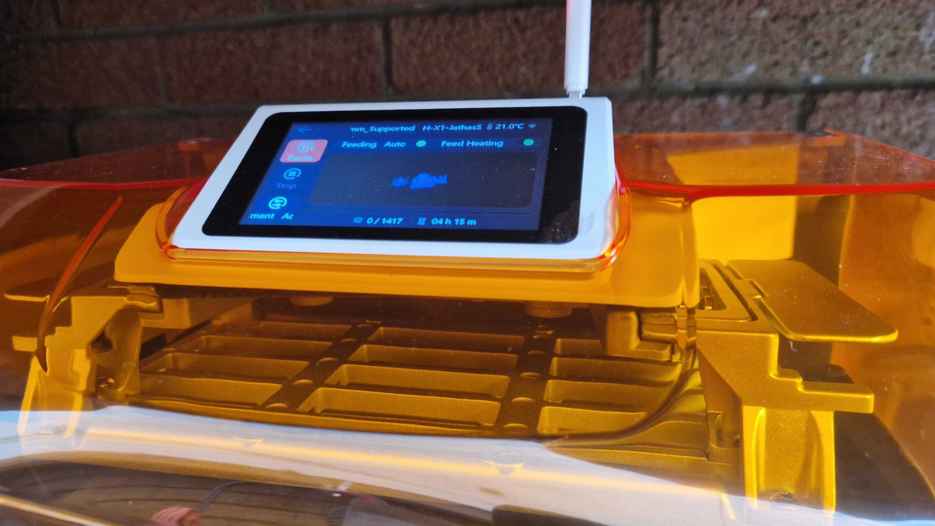 The Creality Halot-X1 screen, seen against a brick wall