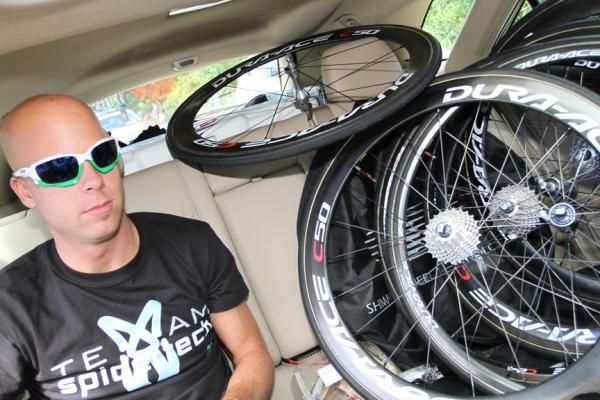 Head Mechanic Rick Barrow and a collection of Shimano carbon wheels. As Stage four began with a steep climb, Barrow had outfitted several wheels with 27-tooth cassettes.