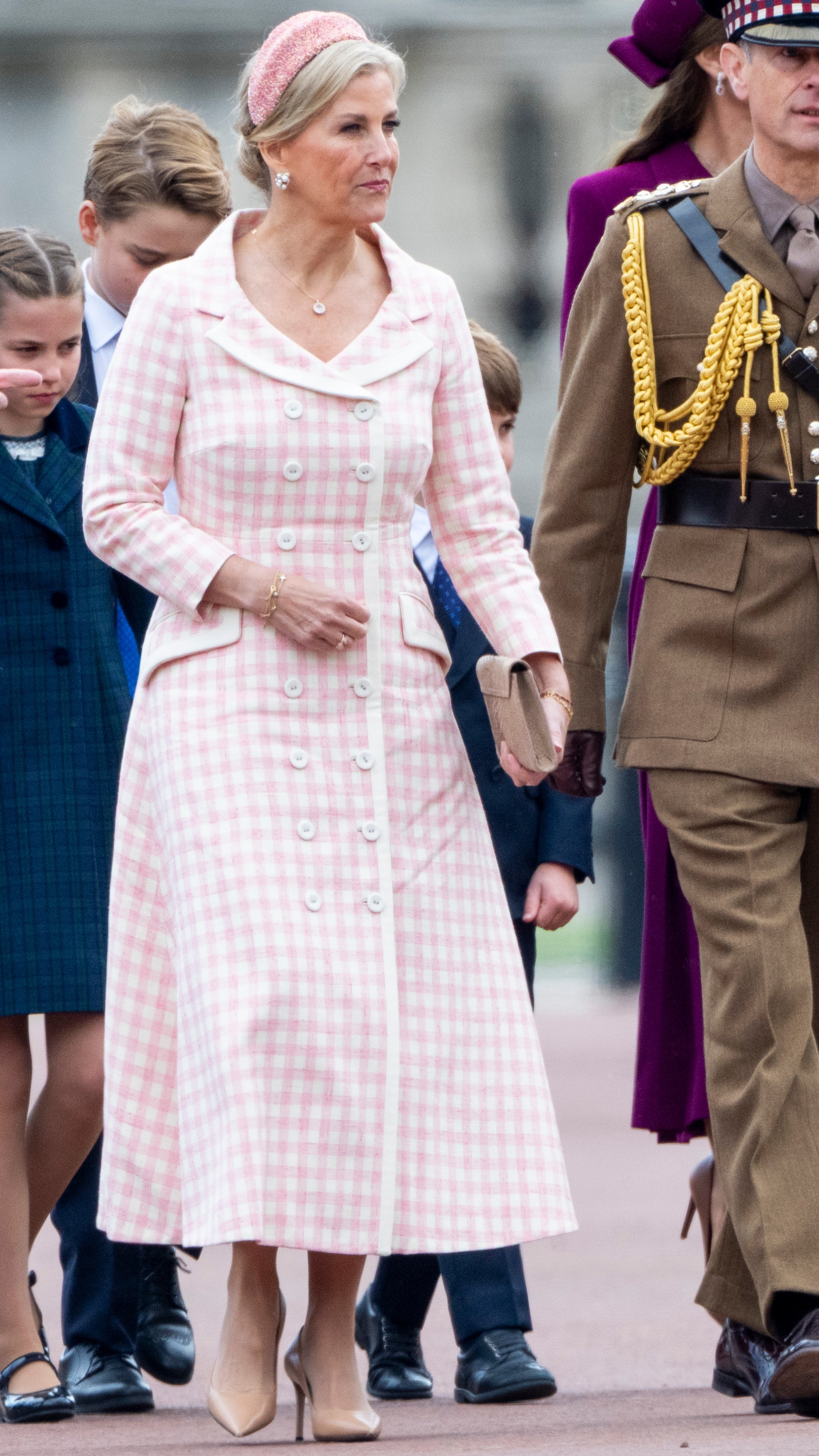 Prince Edward, Duke of Edinburgh and Sophie, Duchess of Edinburgh walk to attend the military procession to mark the 80th anniversary of VE Day