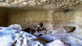 The remains of bones and artifacts were found inside one of the tombs unearthed at the site of Gebel el Silsila in southern Egypt.