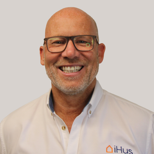 Head and shoulders photo of Andrew Colley of iHus