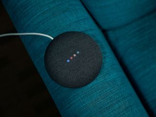 Google Nest Mini sitting on a chair